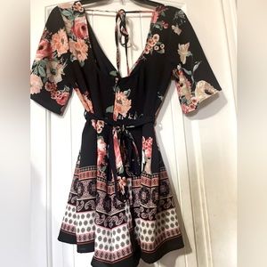 Floral romper with the waist tie